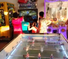 Children standing together with their arms around one another